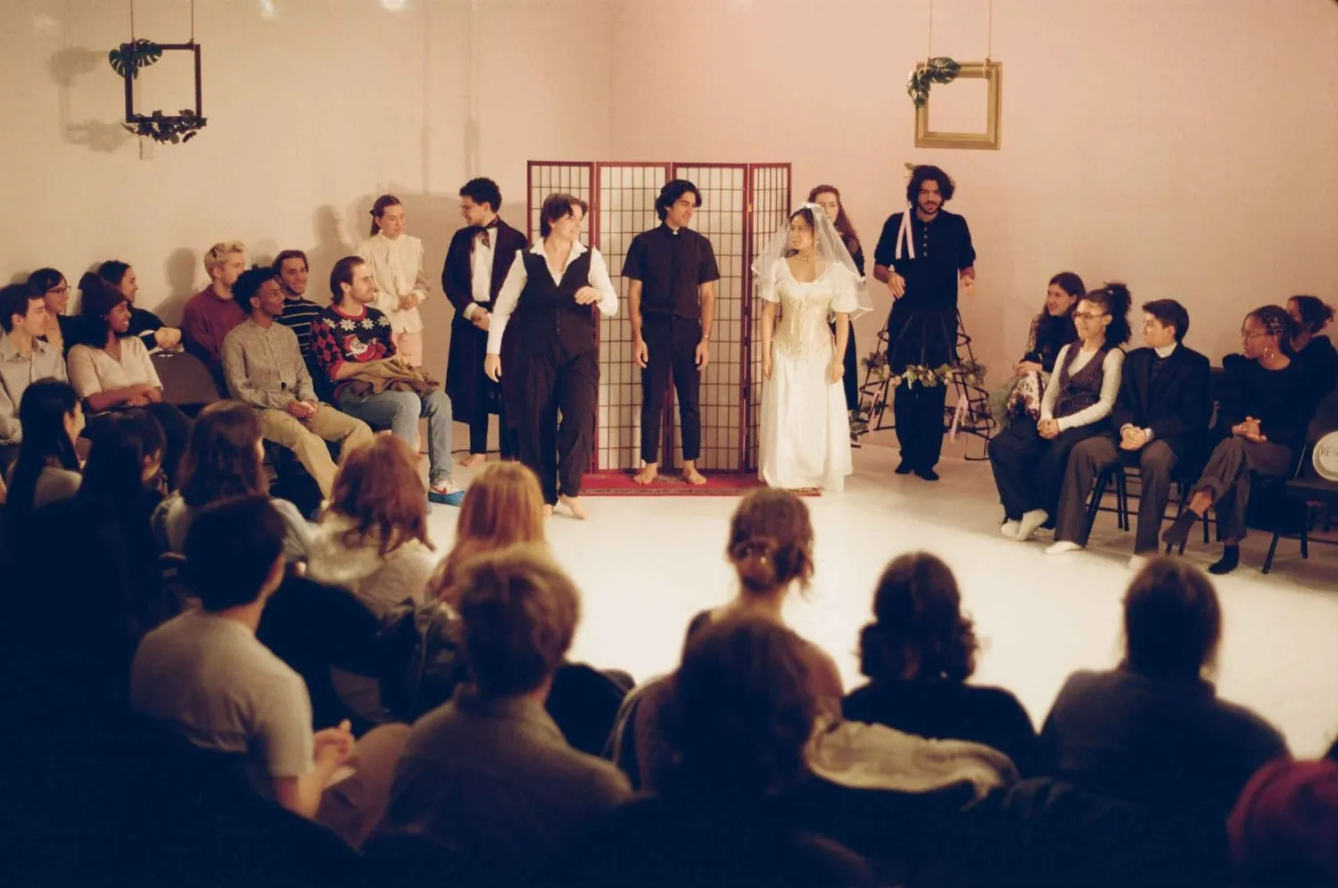 The Greenhouse company performs a wedding scene for an audience seated in the round